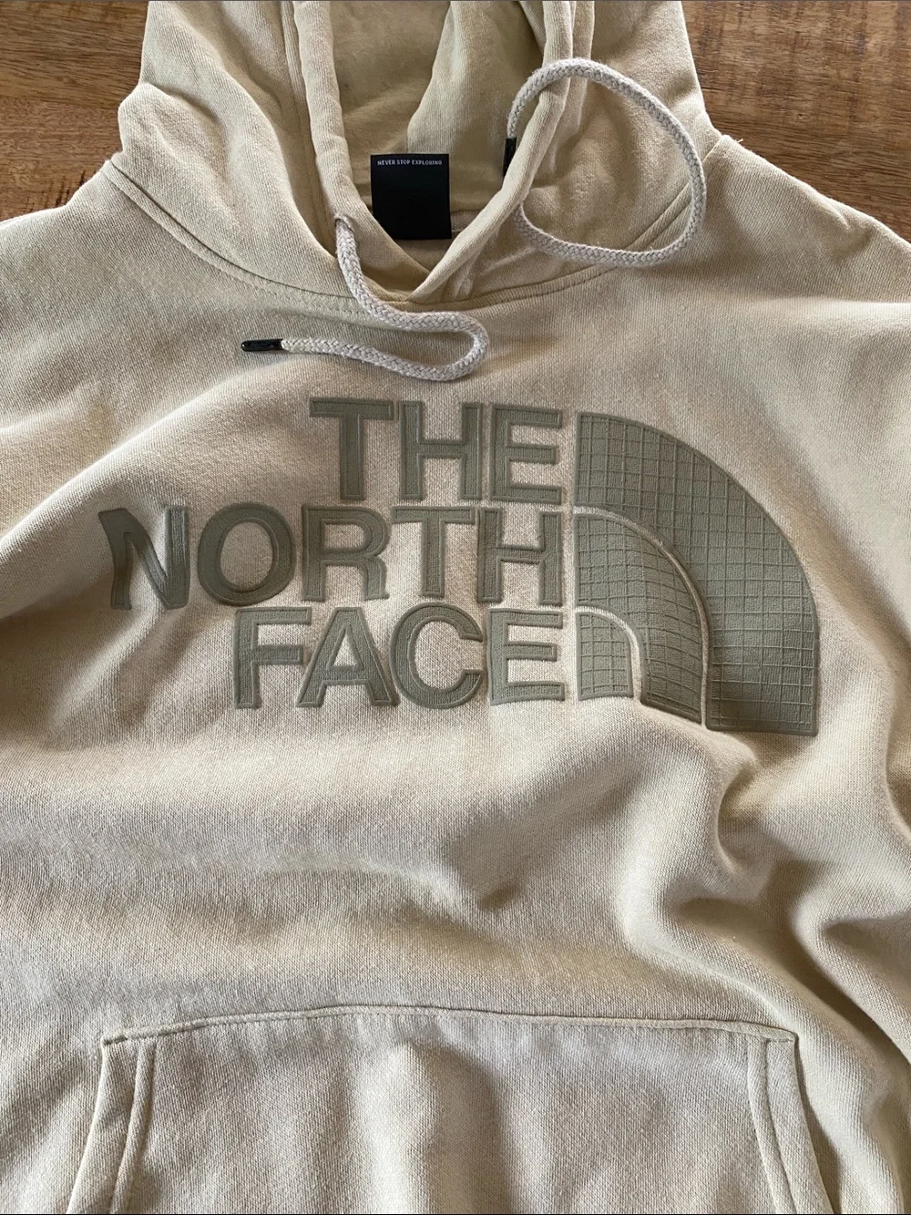 The North Face Men's Hoodie in Light Beige with Tonal Logo